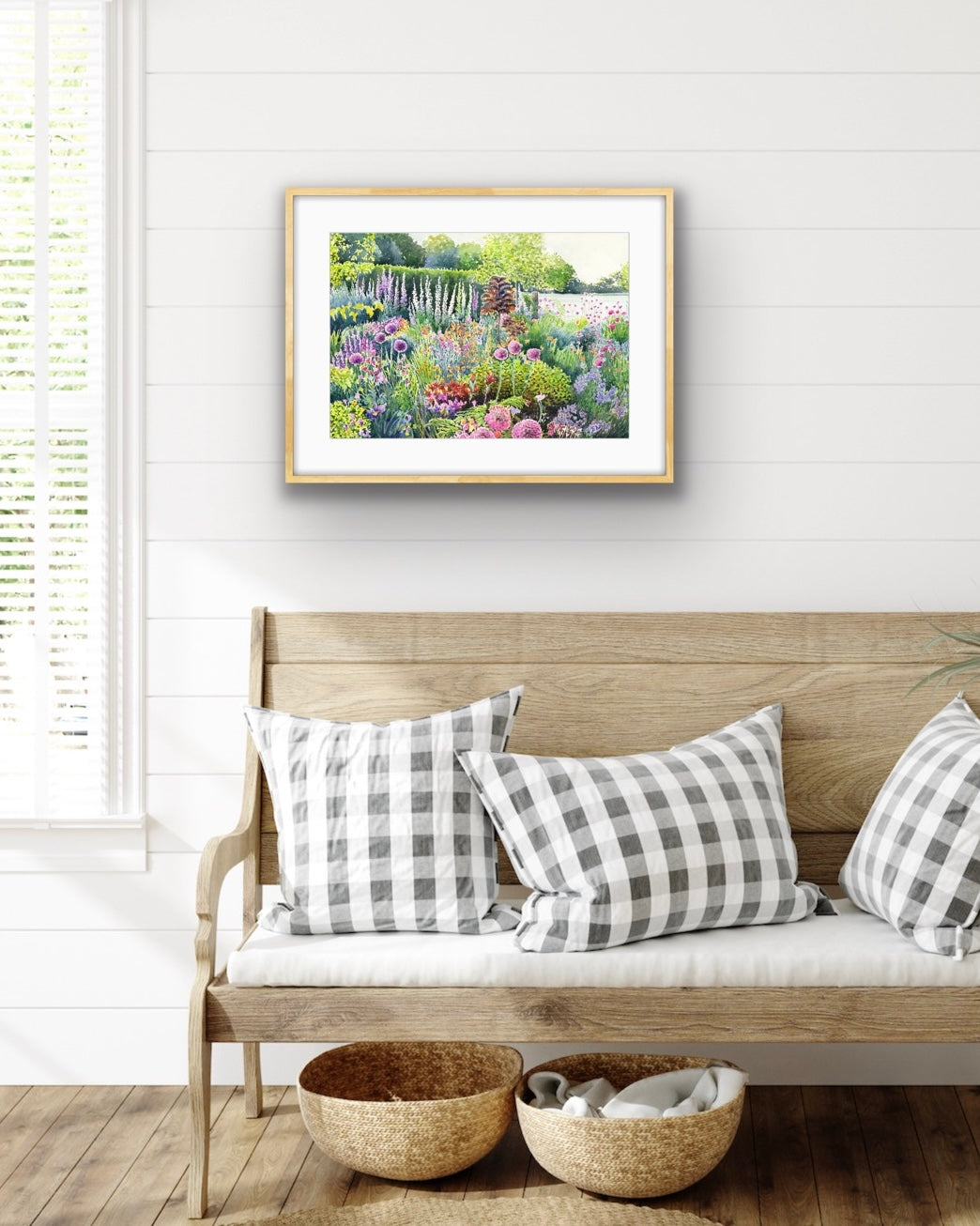 Colourful Spring Summer garden landscape watercolour painting with flowers and plants in foreground and field behind